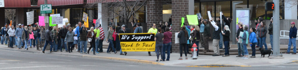 Supporters of Cat Country radio DJ Paul Mushaben start their march from KTVQ2 past Billings Gazette to the Double Tree Hotel in their 2nd rally in a week. (Jonathan McNiven Photo)