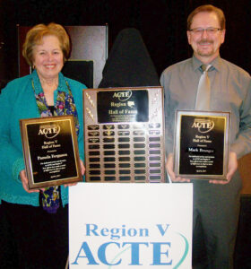 Mark Branger, right, and Pam Ferguson received the Region V Hall of Fame Award at the 2017 Region V ACTE conference in Rapid City, South Dakota. (Courtesy photo)