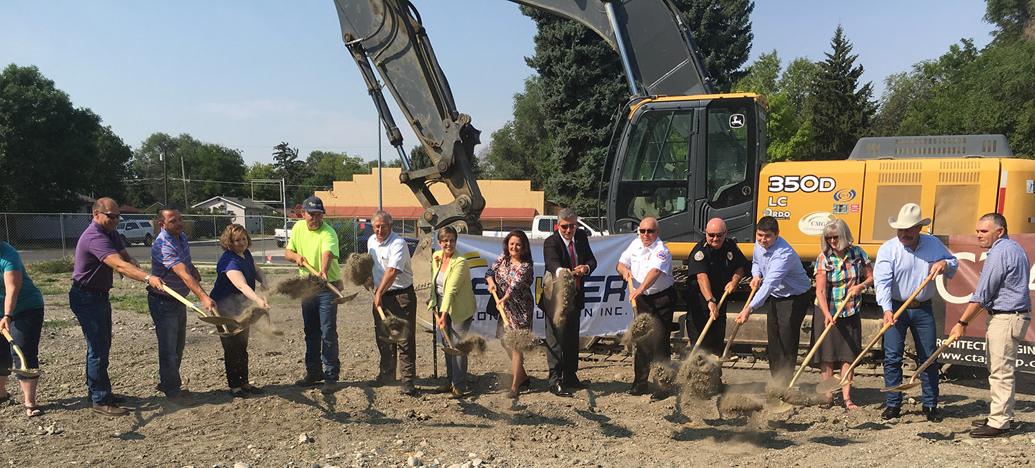 County and City of Billings Officials dig in to start the construction project of the new 911 call center in Billings for Yellowstone County. (photo Dennis Ulvestad)
