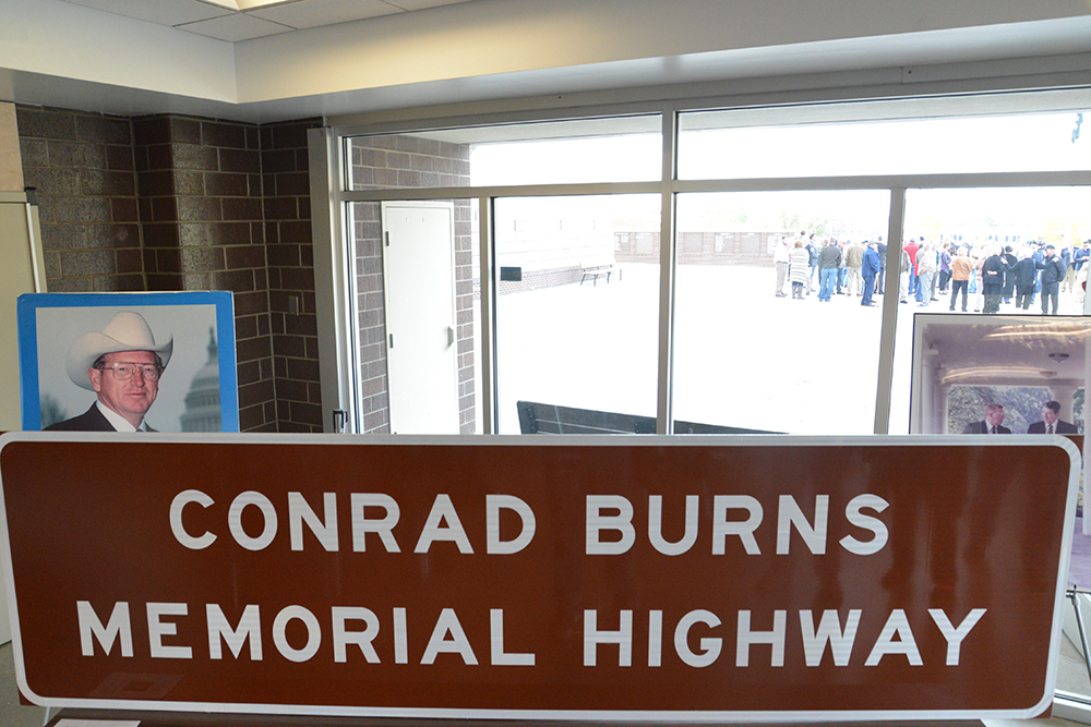 Yellowstone County officials and guests on Wednesday unveiled a highway sign proclaiming Airport Road as the Sen. Conrad Burns Memorial Highway. (Jonathan McNiven photos)