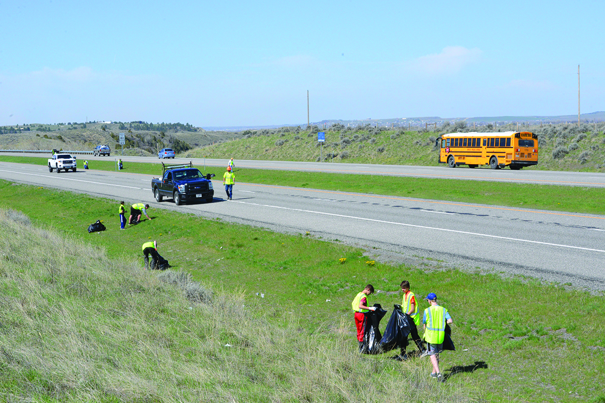 Volunteers picking up trash along Interstate 94 on Saturday, April 28, 2018. (Jonathan McNiven Photo)