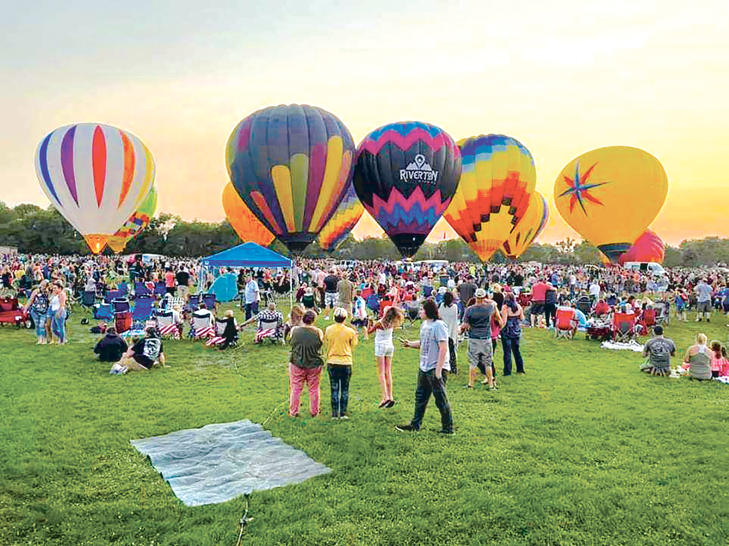 Drone image captures hot air balloon eclipse with the sun as hot air balloons float in the smoky skies over Billings Saturday morning at this years 2021 Balloonfest. (Drone image by Jonathan McNiven)