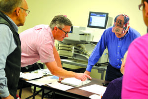 County Elections Department Director Bret Rutherford explains how the ballots are tabulated and how the ballot counting machines work. (courtesy photo)