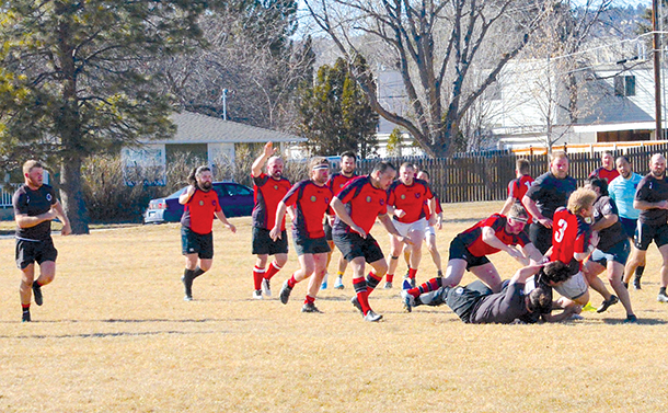 Local rugby players from the Magic City Marmots and Missoula Maggots battle it out on the lawn of Rose Park on the Billings West End on Saturday, March 18. (Michael Marino photo)