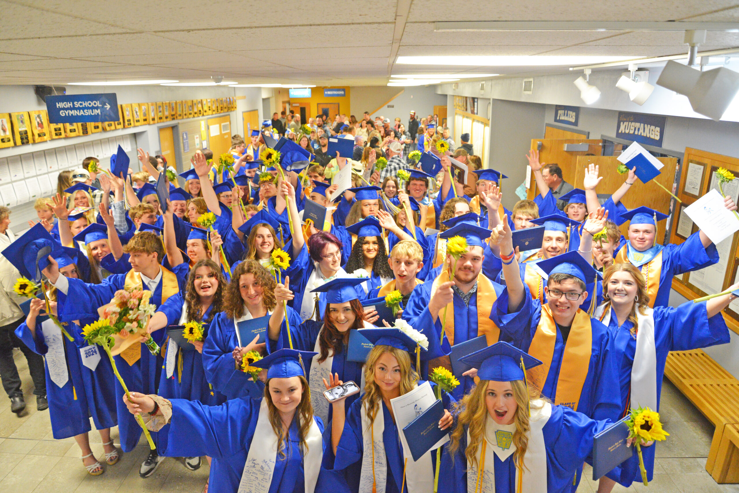 Shepherd High School Graduating Seniors pose for a group celebration picture after the graduation ceremony Sunday May 19, 2024. (Jonathan McNiven Photo)