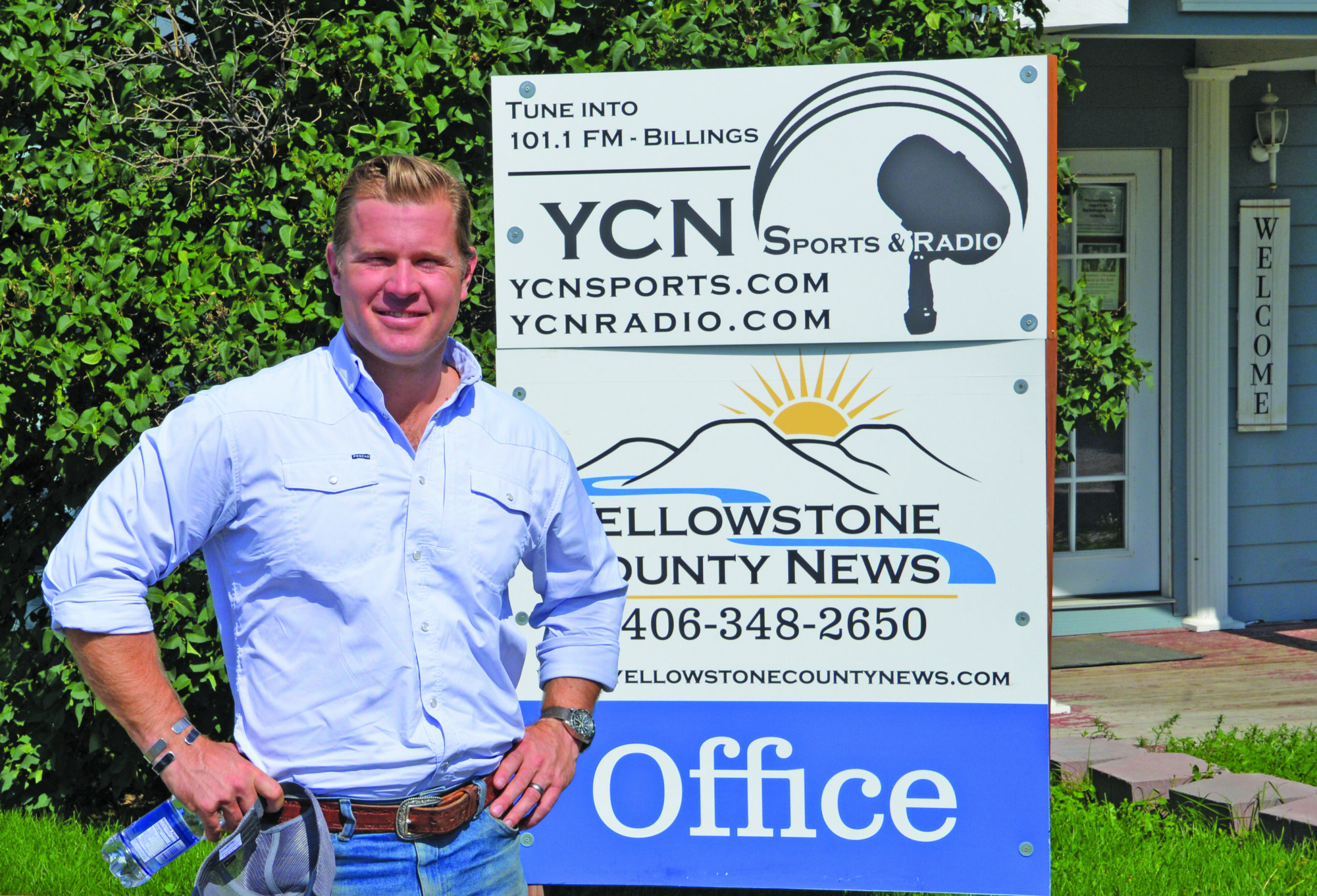 US Senate Candidate Tim Sheehy poses in front of the Yellowstone County News office and sign after taking the time to be interviewed on Wedneday August 14th, 2024. (Even Hood photo)