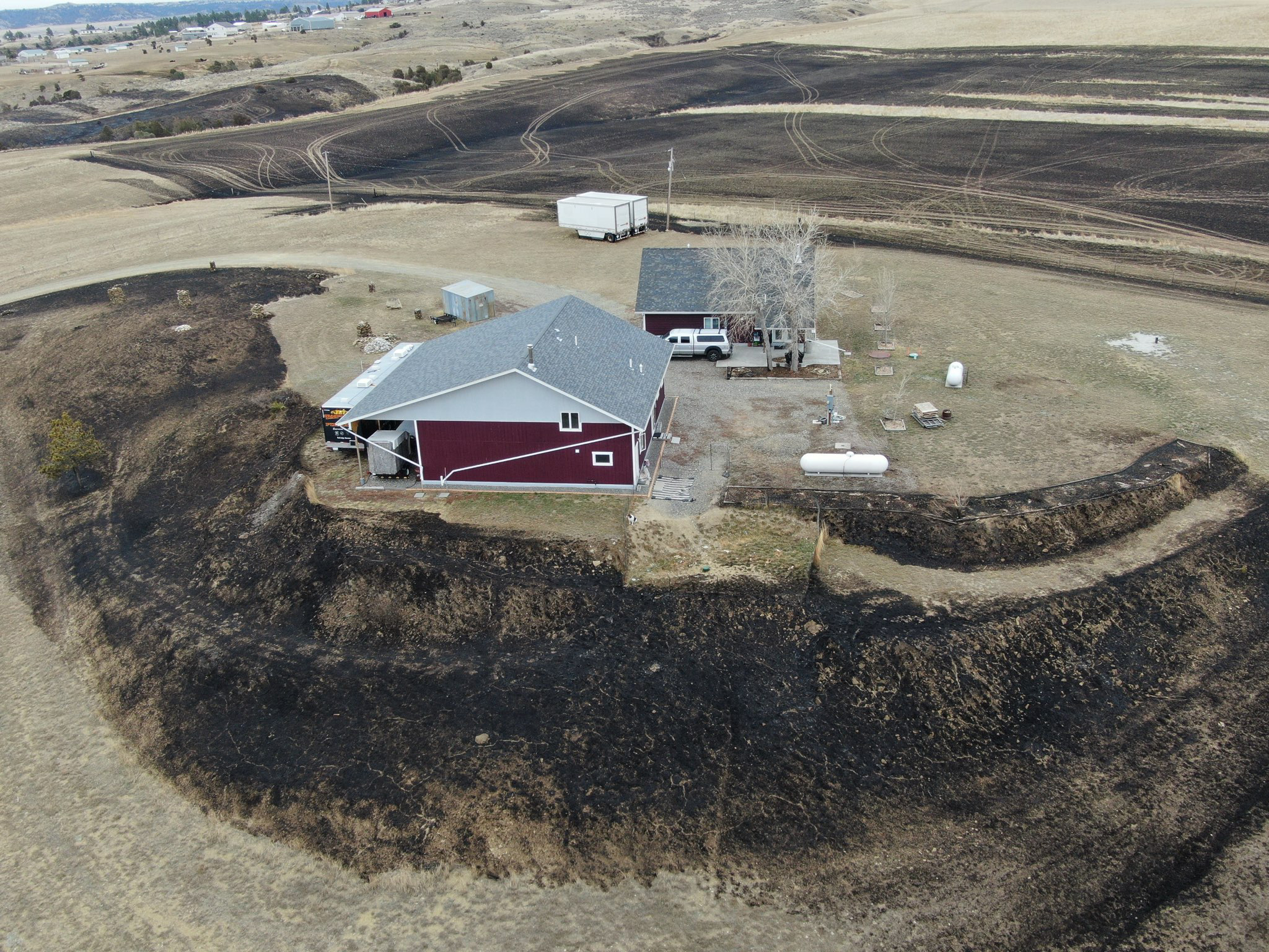 This house along Rock Pillar Rd in Huntley was saved by Worden Fire Department firefighters as winds up to 50 miles an hour scorched the ground. (Drone Image by Jonathan McNiven)